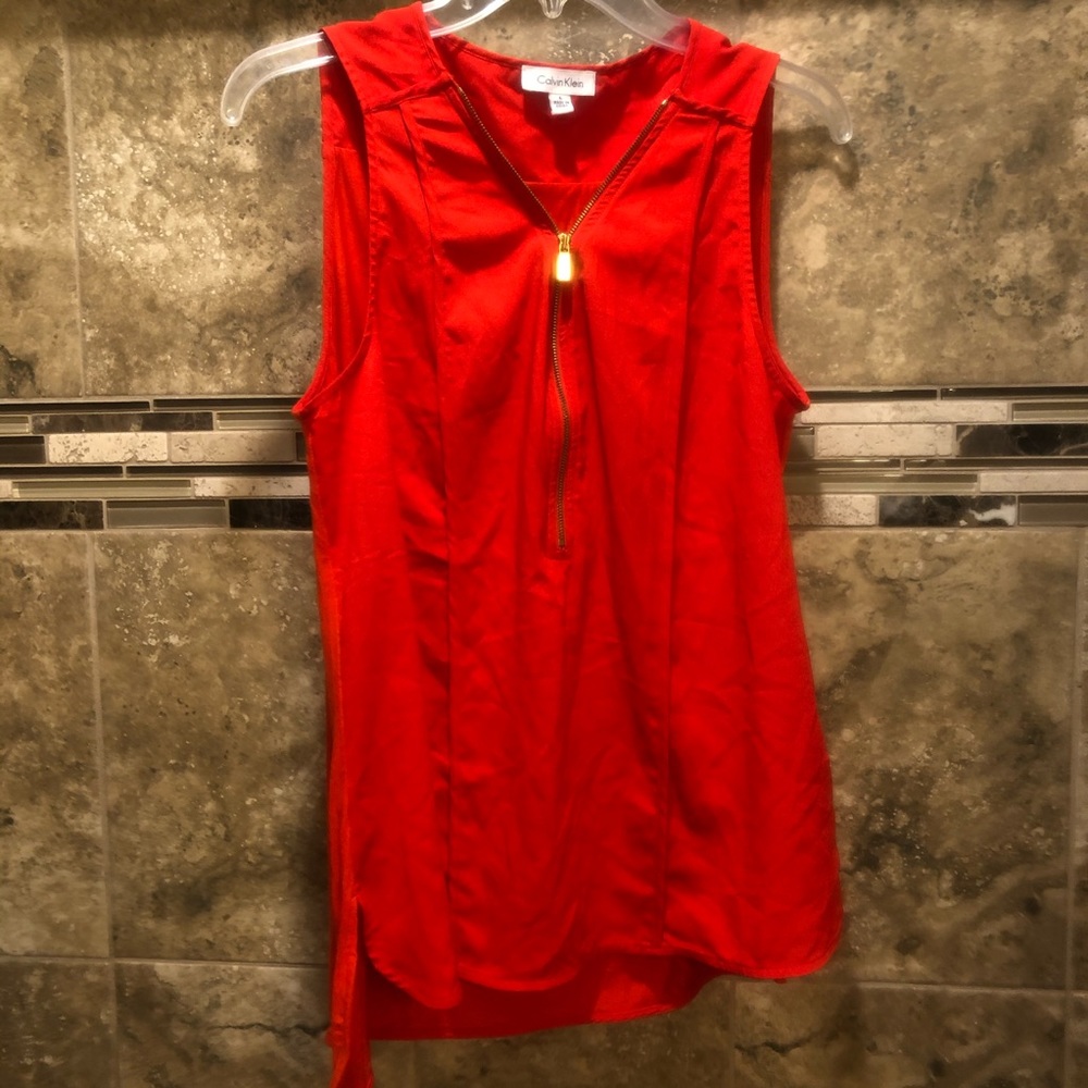 Calvin Klein orange shirt, size large